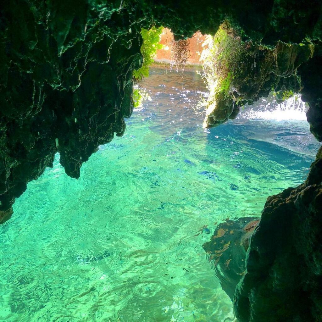 Emerald caves under the Fossil Creek waterfall.